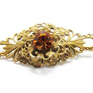 1930s Vintage Head Turning Topaz Rhinestone Gold Filigree Pin